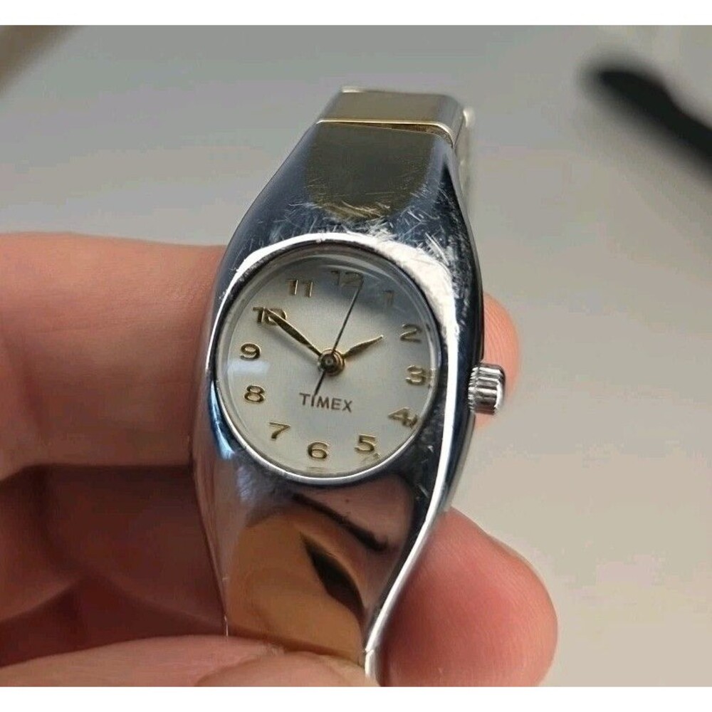Ladies Timex gold/silver tone stretch stainless steel bracelet watch